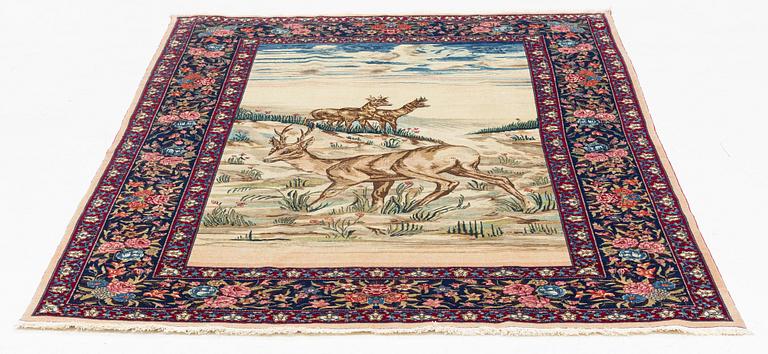 A semi-antique Isfahan rug, so-called Ahmad, 210 x 143 cm.