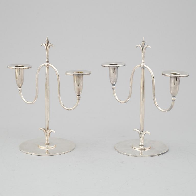 a pair of Elis Bergh silver plated candelabras, Swedish grace, CG Hallberg, Stockholm, 1920s.