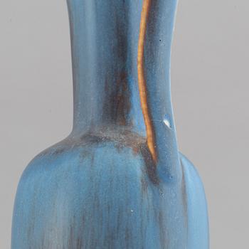 Gunnar Nylund, a set of five stoneware vases and two bowls and Carl-Harry Stålhane, a set of two vases for Rörstrand.