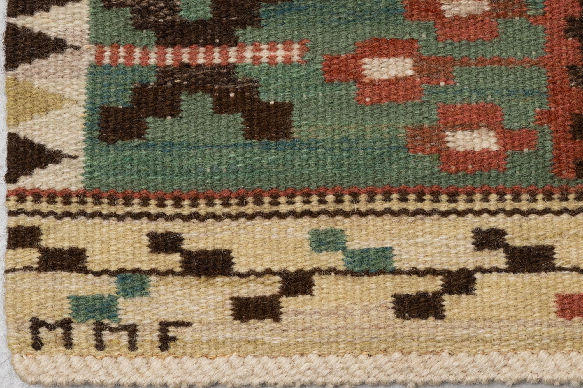 Märta Måås-Fjetterström, A textile, "Rabatten", flat weave, ca 132 x 42 cm, signed MMF.