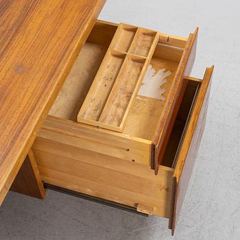 Florence Knoll, a model 590-036 walnut-veneered desk, by Nordiska Kompaniet in Sweden for Knoll International, 1962.