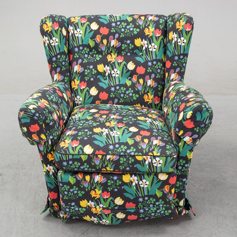 A sofa and wingback chair, later part of the 20th Century.