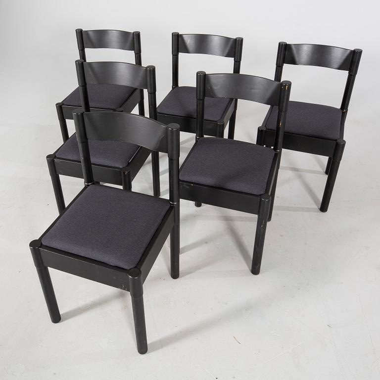 Vico Magistretti, a set of six chairs.