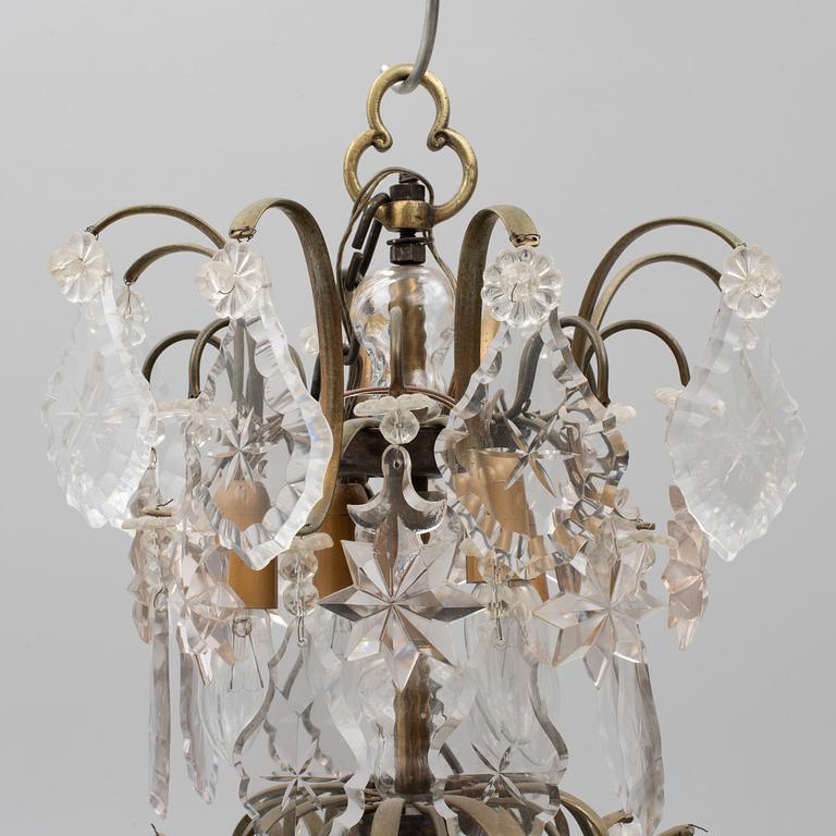 A Rococo style chandelier, early 20th century.