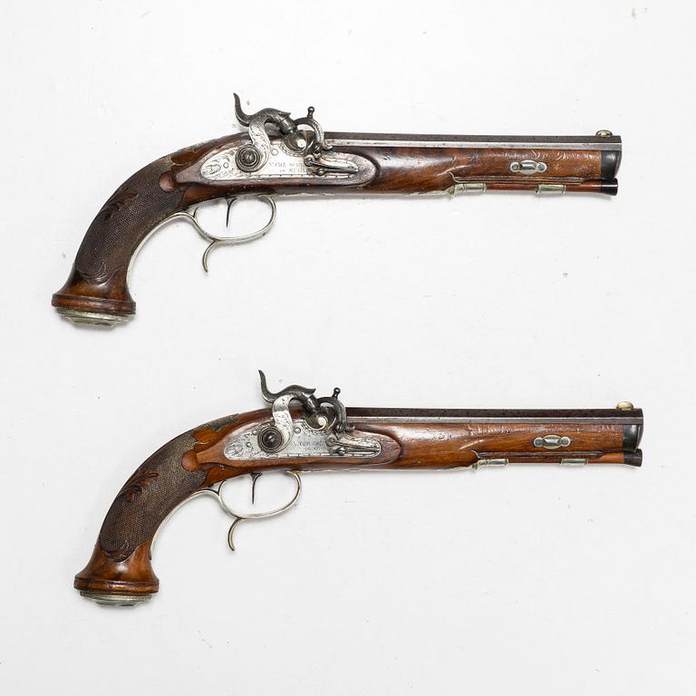 A pair of percussion pistols, Germany, Signed V Chr Schilling in Suhl (Valentin Christoph S. active from 1849).