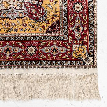 An oriental silk rug, c. 150 x 92 cm.