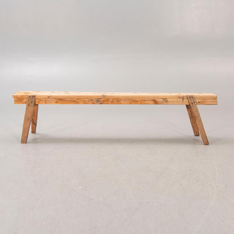 A wooden bench around 1900.