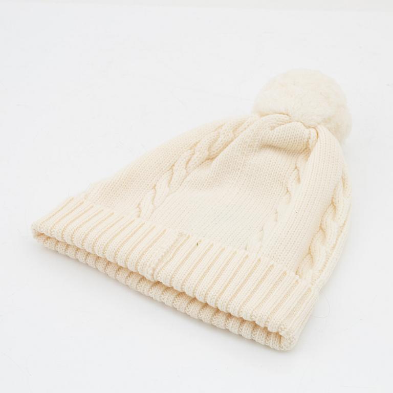 Christian Dior, a set with a pair of wool gloves and a knitted hat.