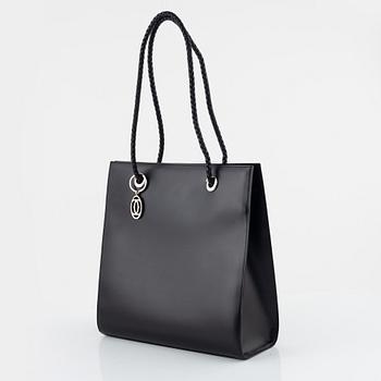 Cartier, a black leather bag.