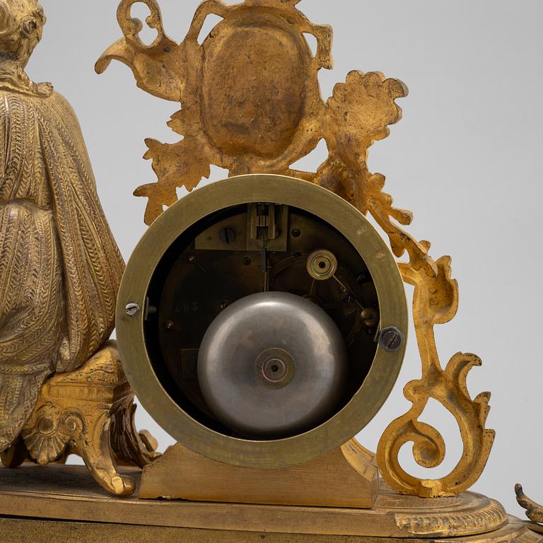 A Louis XVI-style ormolu and parcel gilt mantel clock, mid 19th Century.