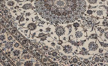 A Nain part silk carpet, 269 x 213 cm.
