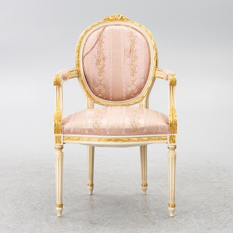 Dining table and armchair, Louis XVI style. Italy, second half of the 20th century.