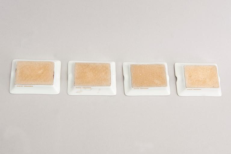 Hermès a set of four porcelain ashtrays later part of the 20th century.