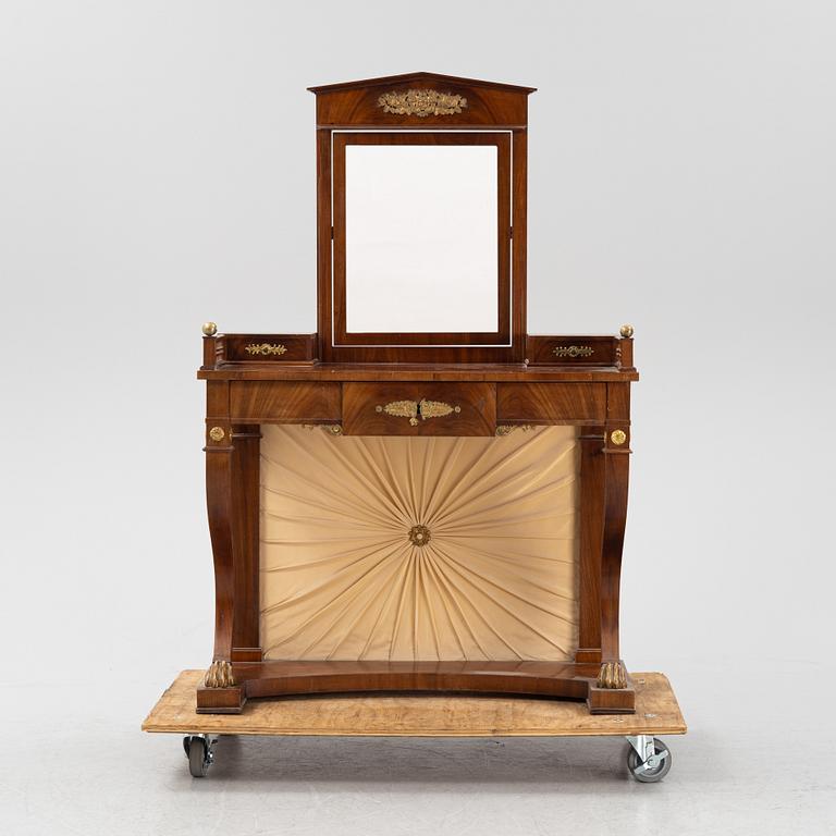 An Empire style dressing table by Johan Öman, Stockholm (1815-33), dated 1827.