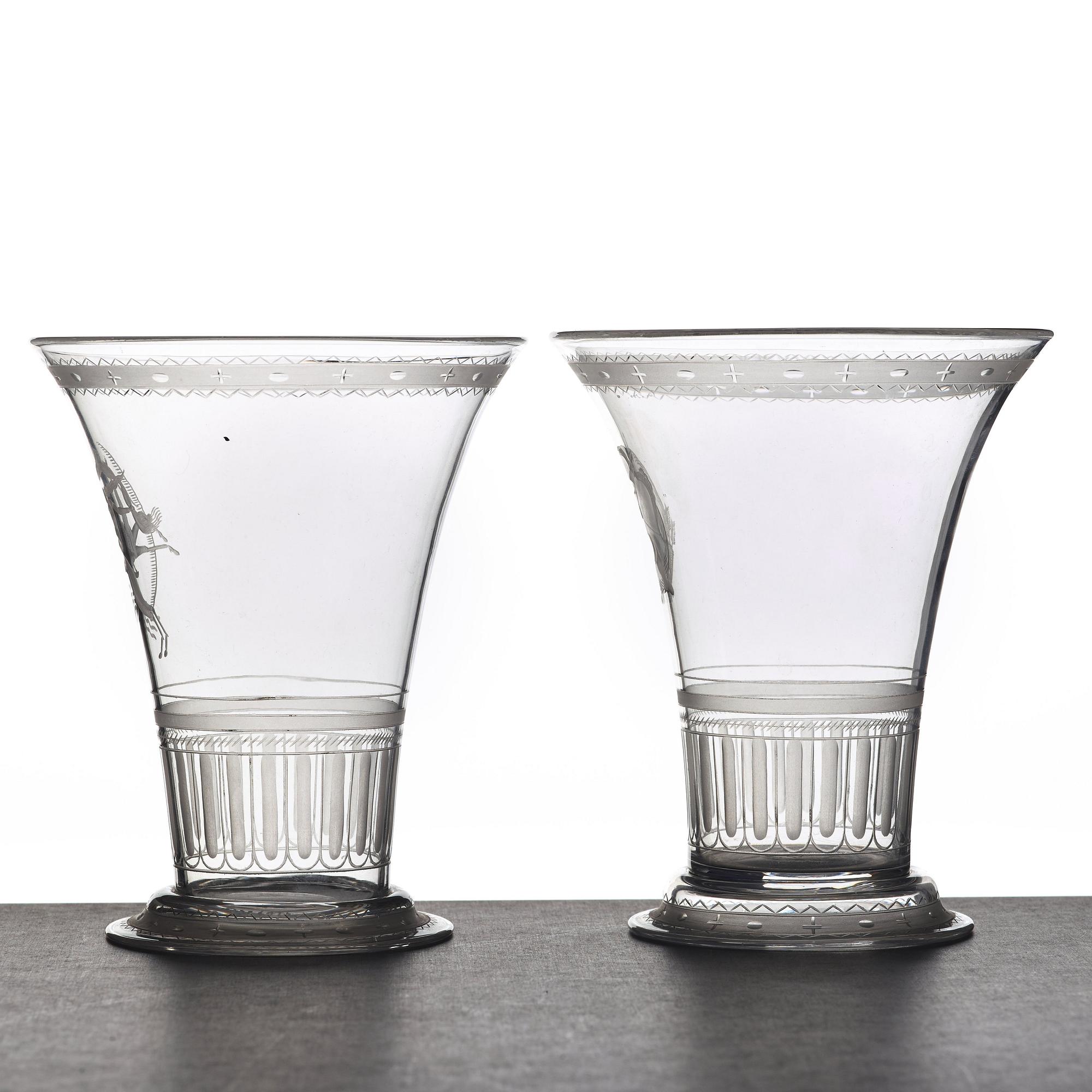 Simon Gate, two Swedish Grace engraved glass beakers, Orrefors, Sweden 1924.