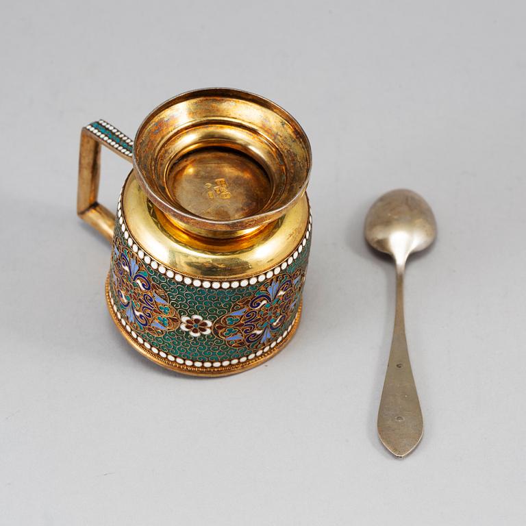 A Russian late 19th century silver-gilt and enameld tea-glass holder, unidentified makers mark, Moscow 1895.