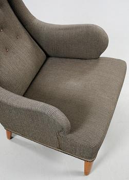 A chair, model Oscar, designed by Carl Malmsten for Carl Malmsten AB, bought 31 of January 1962.