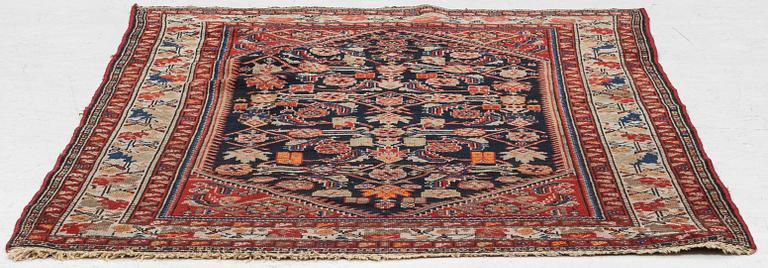 An oriental rug, approx. 148 x 110 cm.