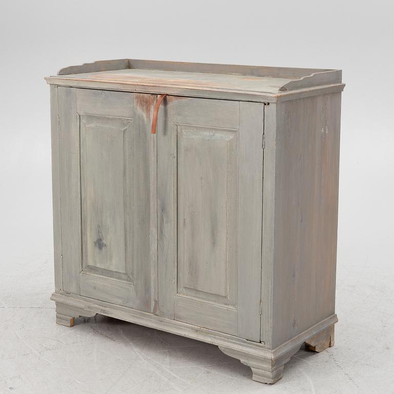 A Gustavian cupboard, circa 1800.