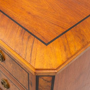 A chest of drawers, circa 1900.