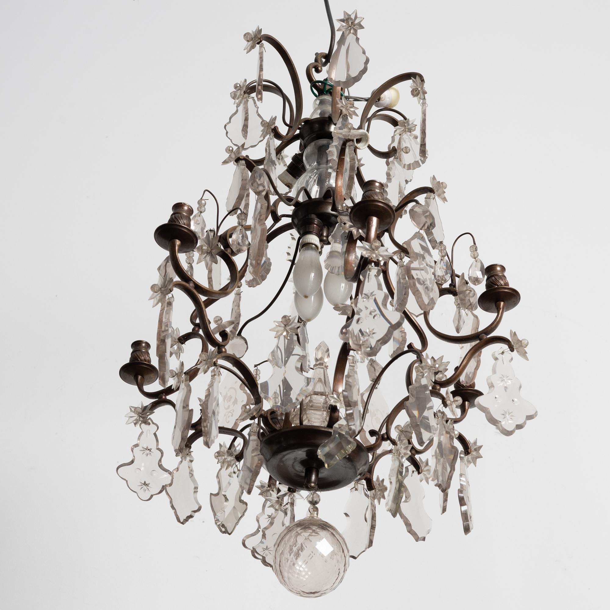 A Rococo style chandelier, early 20th century.