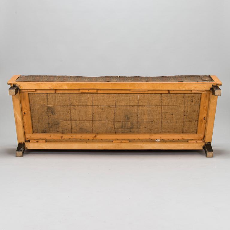 A  1920s Carelian birch veneered sofa.