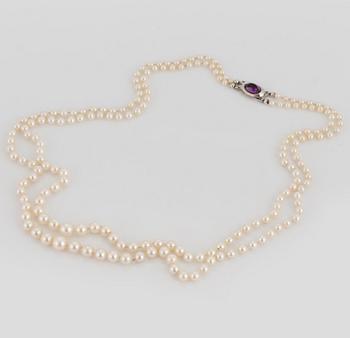 PEARL NECKLACE, silver clasp with amethyst.