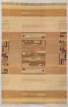 Impi Sotavalta, attributed, a 1930s Finnish flat weave carpet for Kodiksamin Mattokutomo.  Circa 295x190 cm.