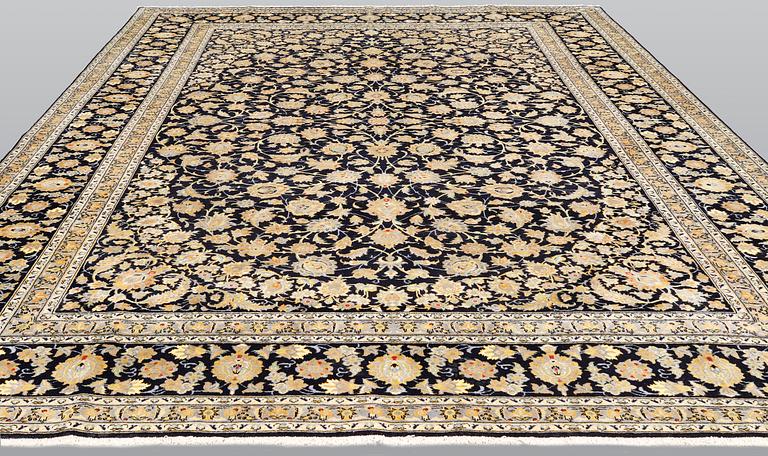 A Keshan carpet, c. 397 x 300 cm.
