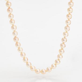 Helminauha, viljellyt helmet, metallilukko.