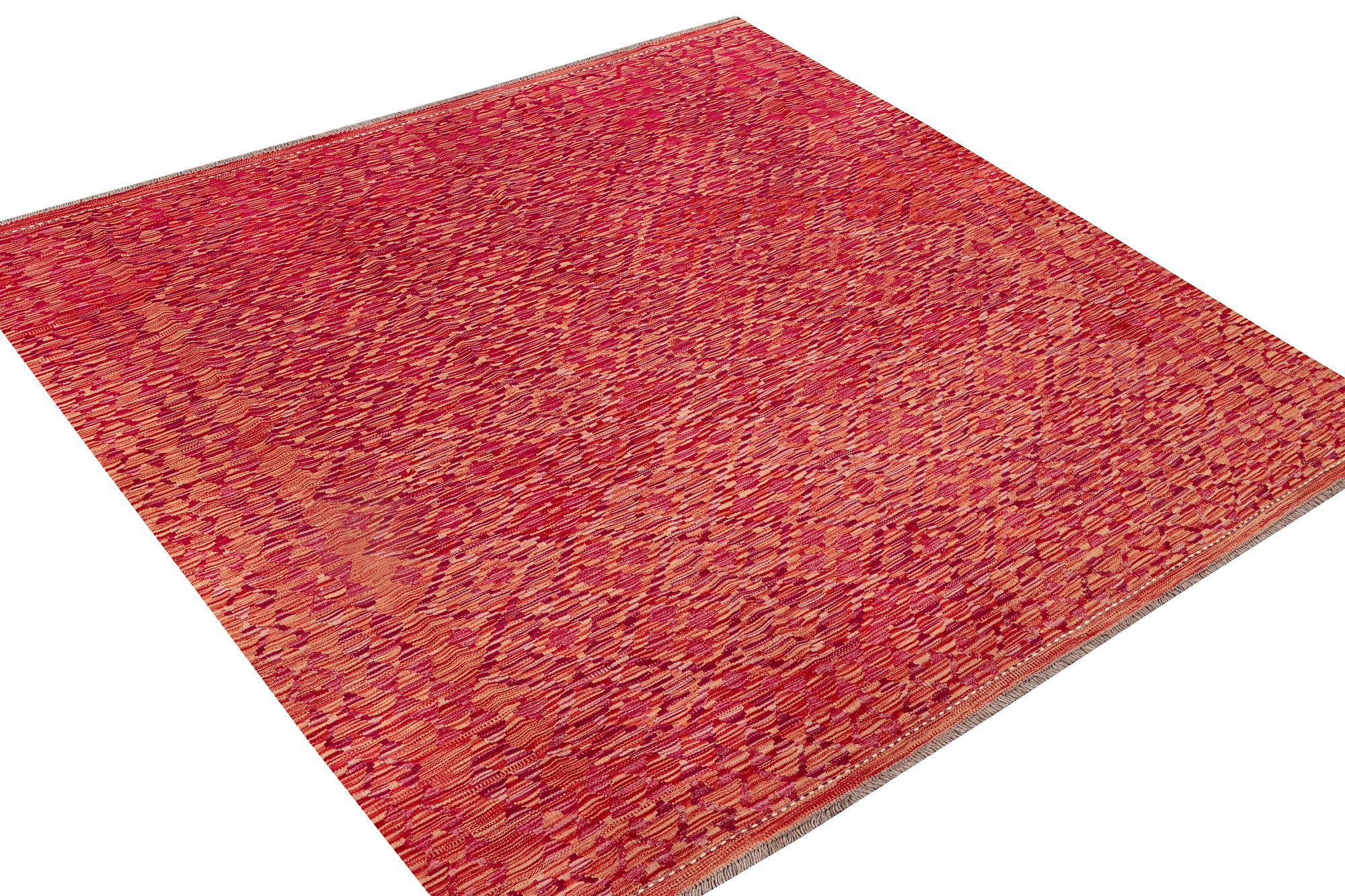 An Afghan Kelim carpet, c. 200 x 199 cm.