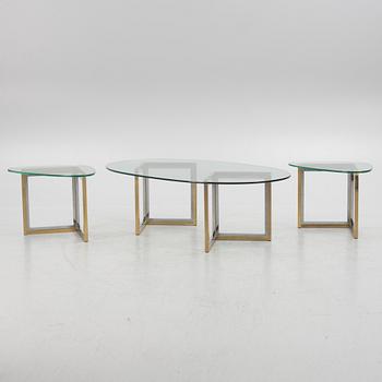 A glass and metal coffee table and a pair of end tables, Englessons, Sweden.