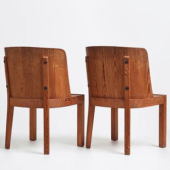 Axel Einar Hjorth, a pair of stained pine "Lovö" chairs, Nordiska Kompaniet, 1930's.