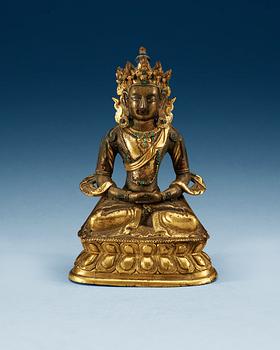 1701. A partial-gilt bronze figure of Avalokiteshvara, Sino-Tibetan, 18th Century.
