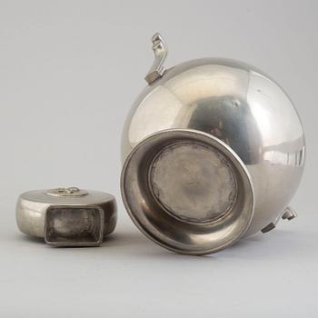 A 1930´s pewter vase and bottle.