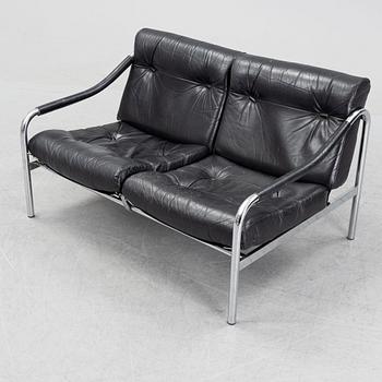 A 1960's leather upholstered 'Kadia' sofa  by Tim Bates for Pieff.