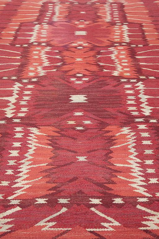 Barbro Nilsson, a carpet, "Strålblomman, röd", flat weave, ca 313,5-316 x 201,5-204,5 cm, signed AB MMF BN.