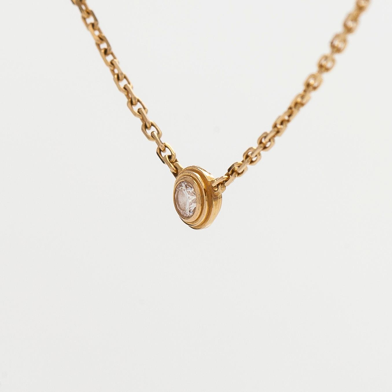 Cartier, an 18K gold 'd'Amour' necklace, with a brilliant-cut diamond.