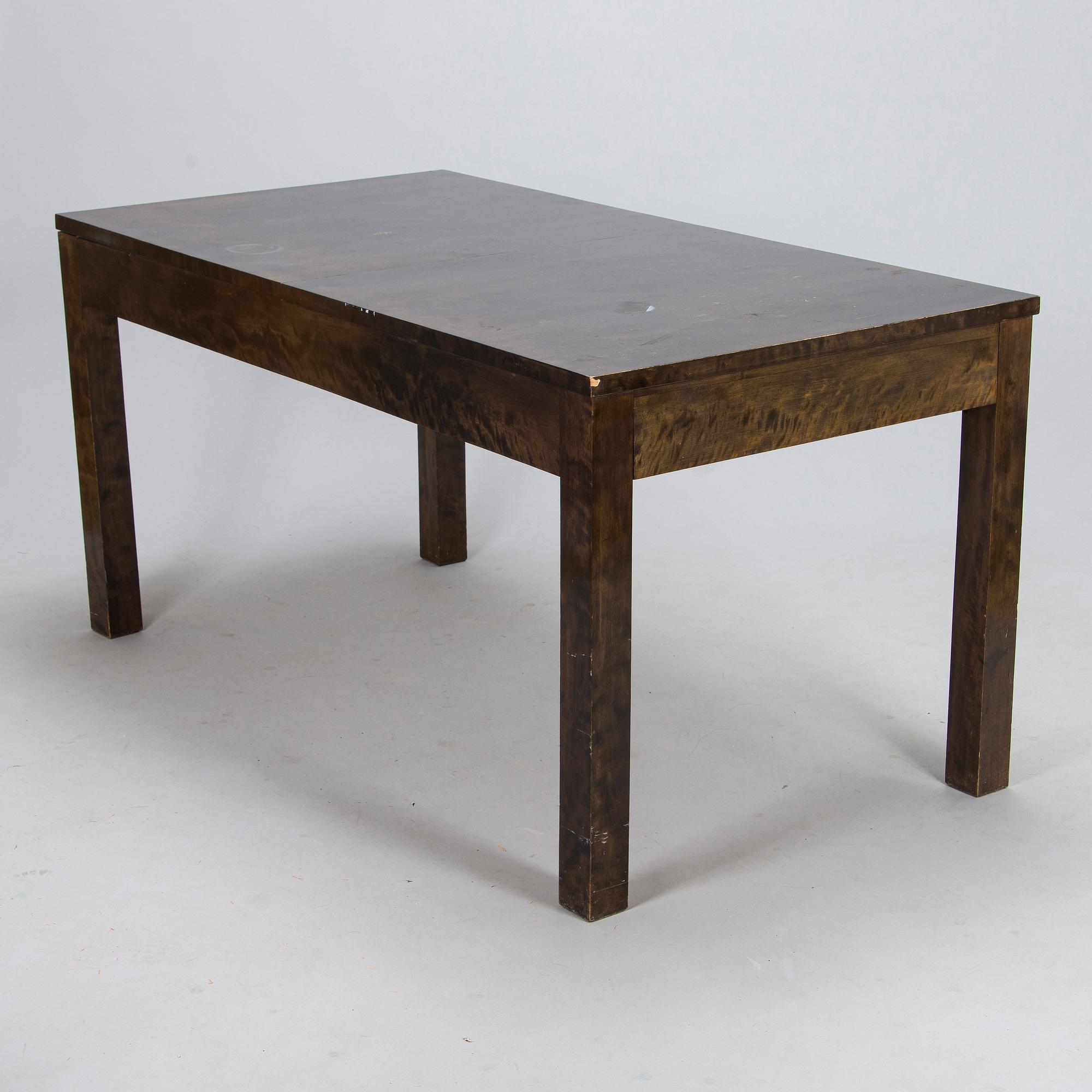 A Finnish 1930s dining table and eight chairs.