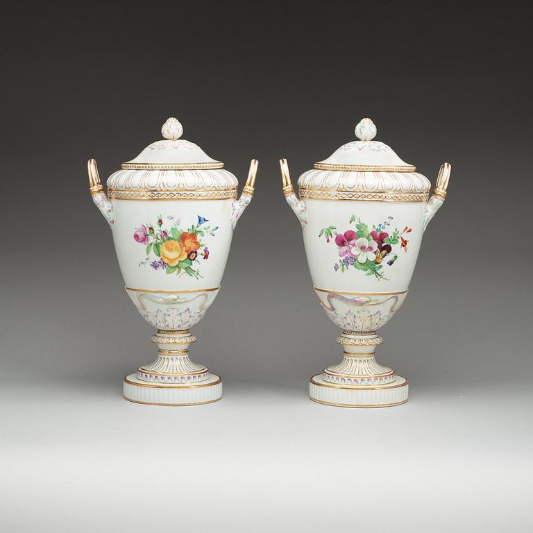 A pair of Berlin KPM jars with covers, circa 1900.