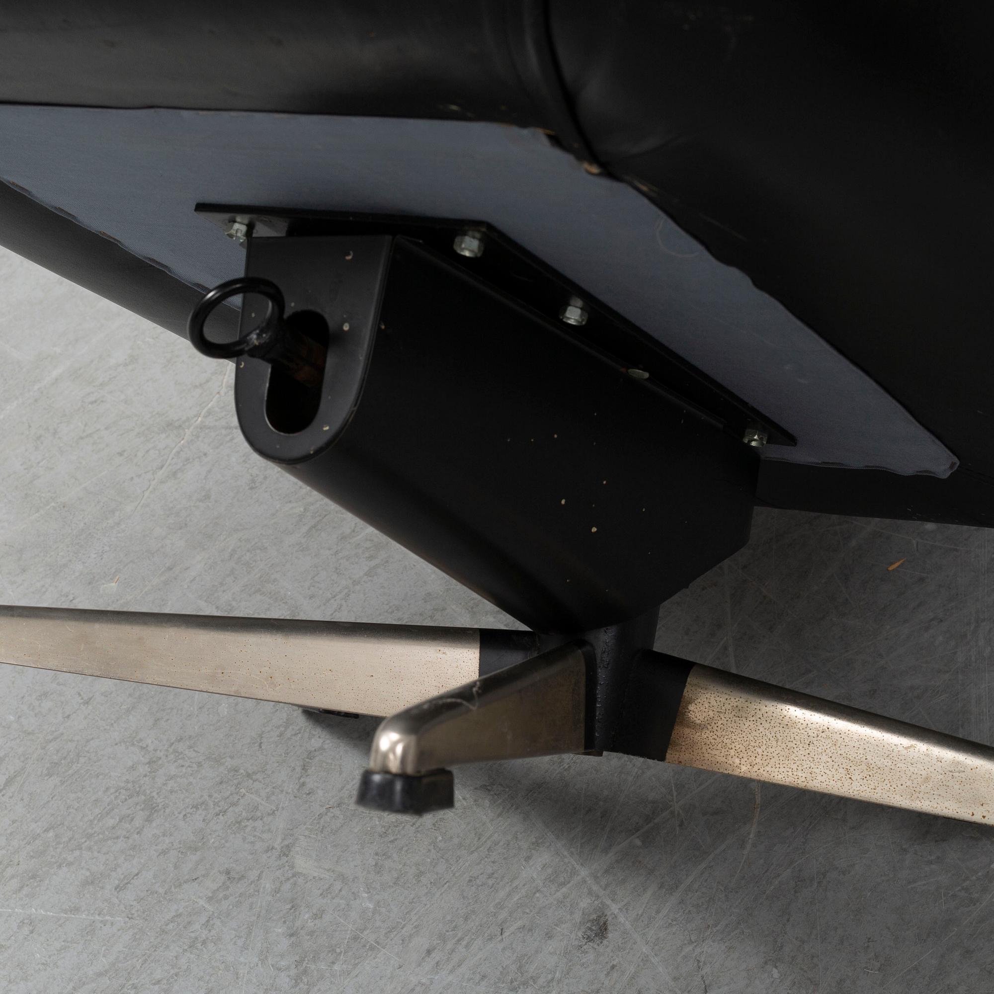 A pair of leather wivel chairs from PeeM, Finland, 1970's.