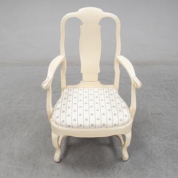 A set of six chairs and a pair of armchairs, rococo style, early 20th century.