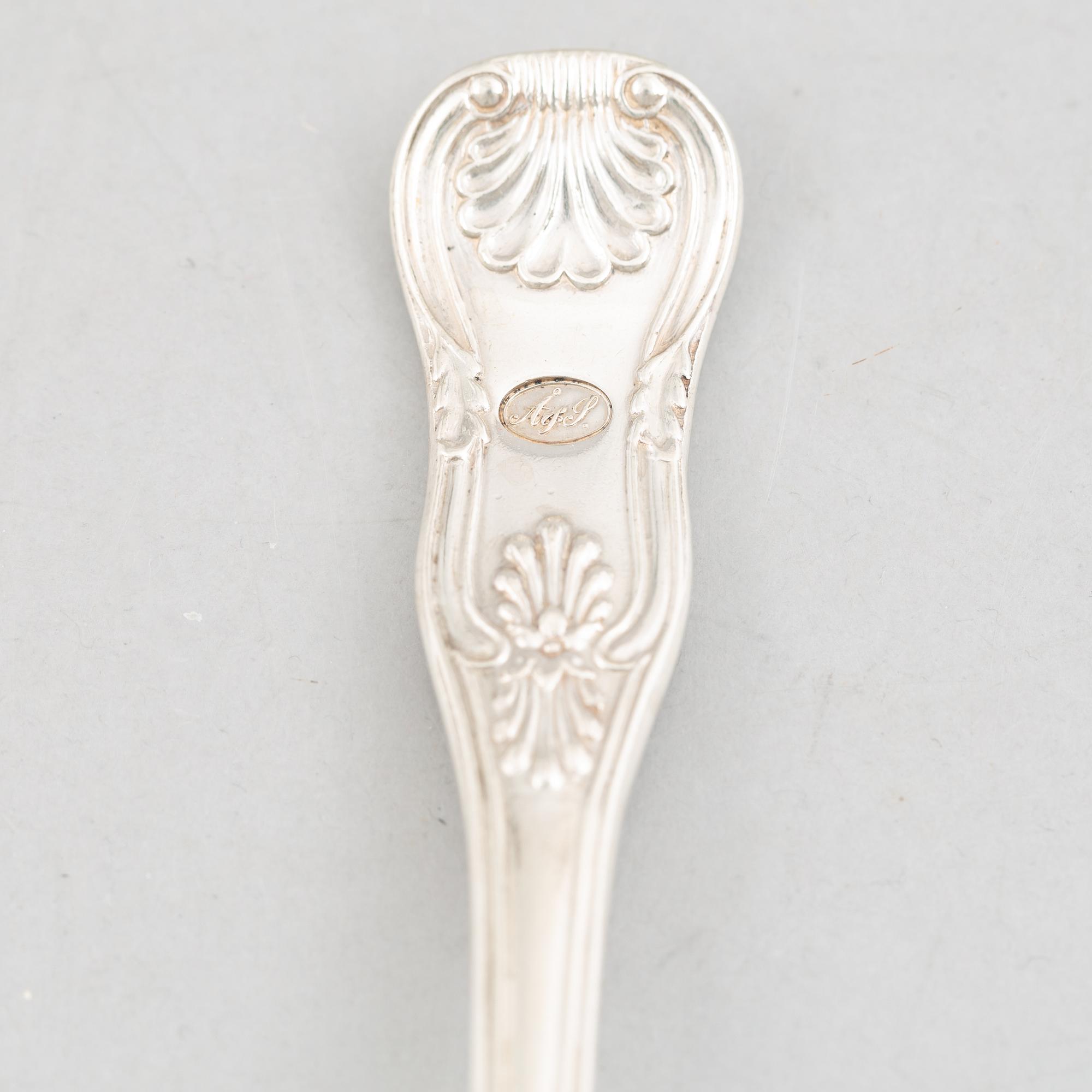 A Set of Twelve Swedish Silver "Kings Pattern" Dinner Spoons.