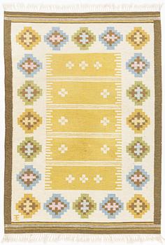 A flat weave carpet, signed EE, ca 242 x 170 cm.