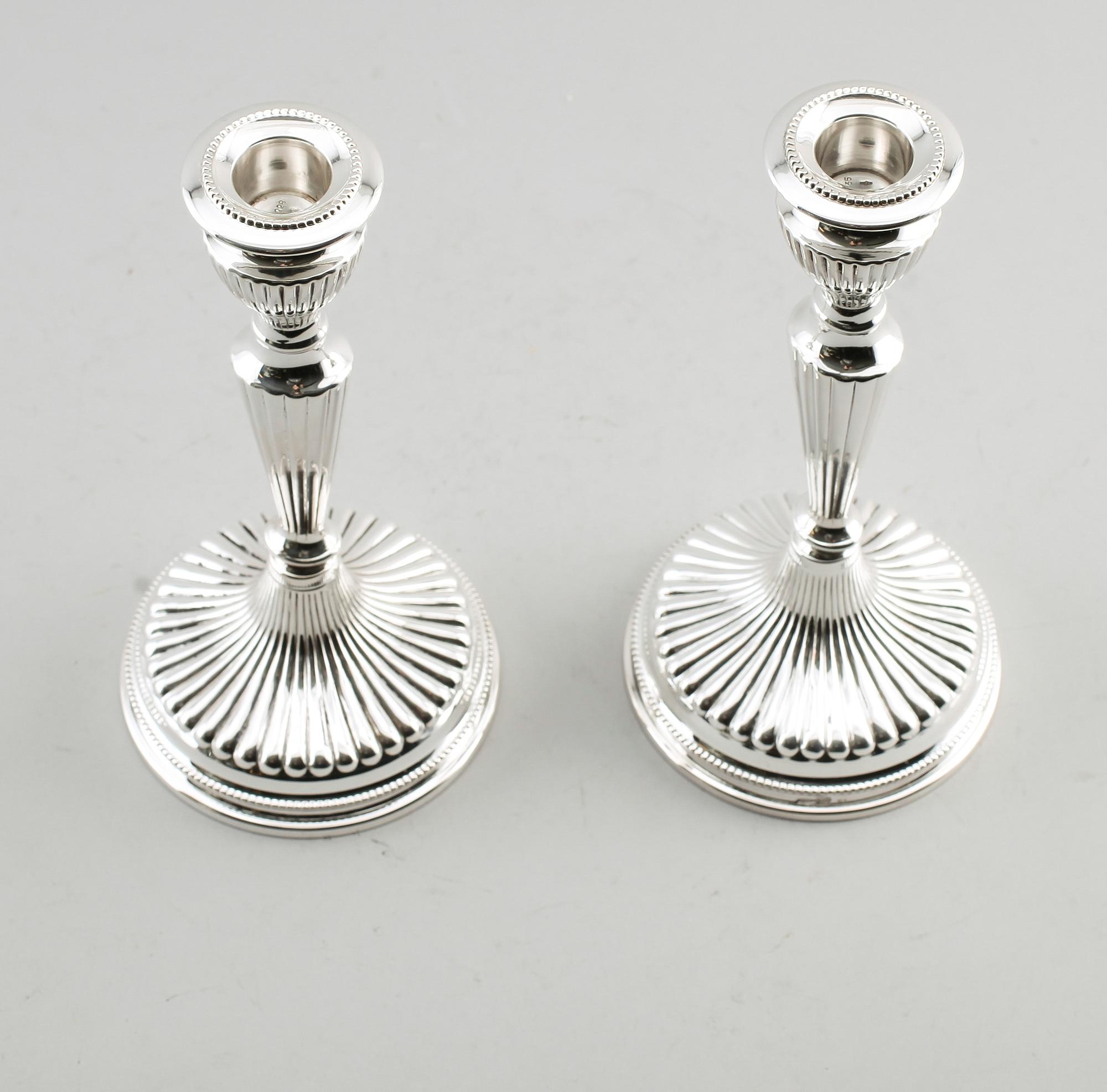 LJUSSTAKAR, 1 par, silver, Finland, 1900-talets första hälft.