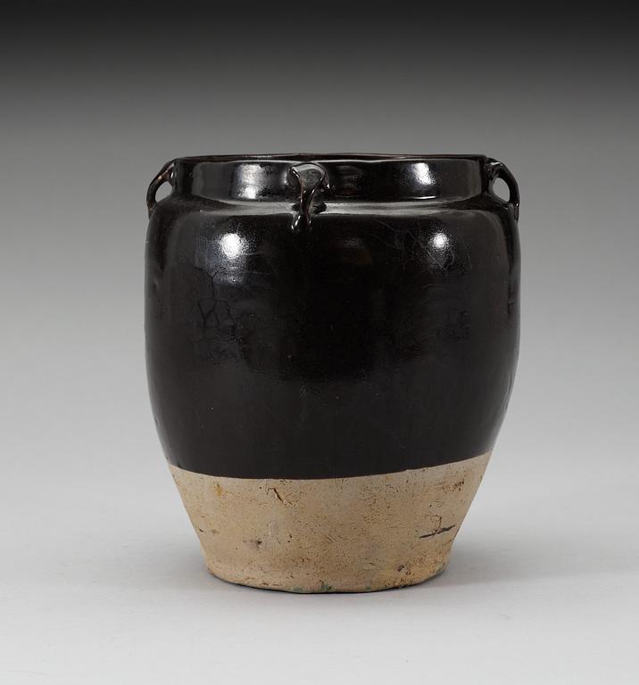 A black glazed jar, presumably Song dynasty.