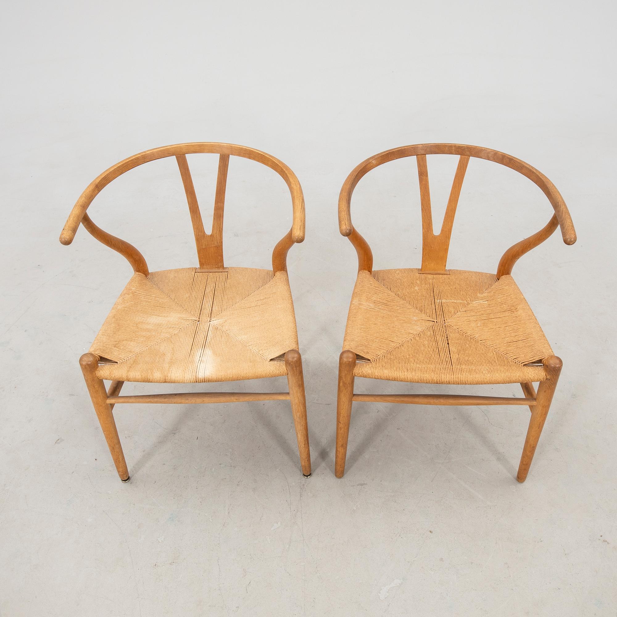 Hans J. Wegner, chairs, a pair, "The Y-Chair", model CH-24, Carl Hansen & Søn, Denmark.