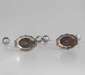 A pair of silver candelabra, Swedish import marks, probably 1920's/30's.