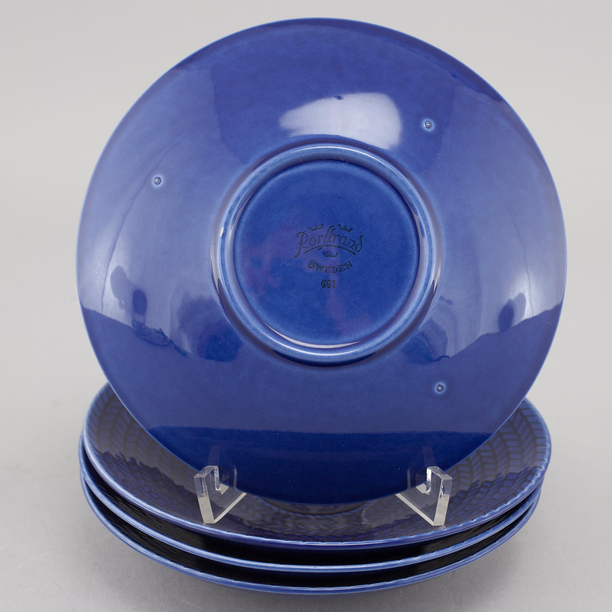 A set of tableware by Hertha Bengtsson called Blå Eld for Gustavsberg during late 20th century.