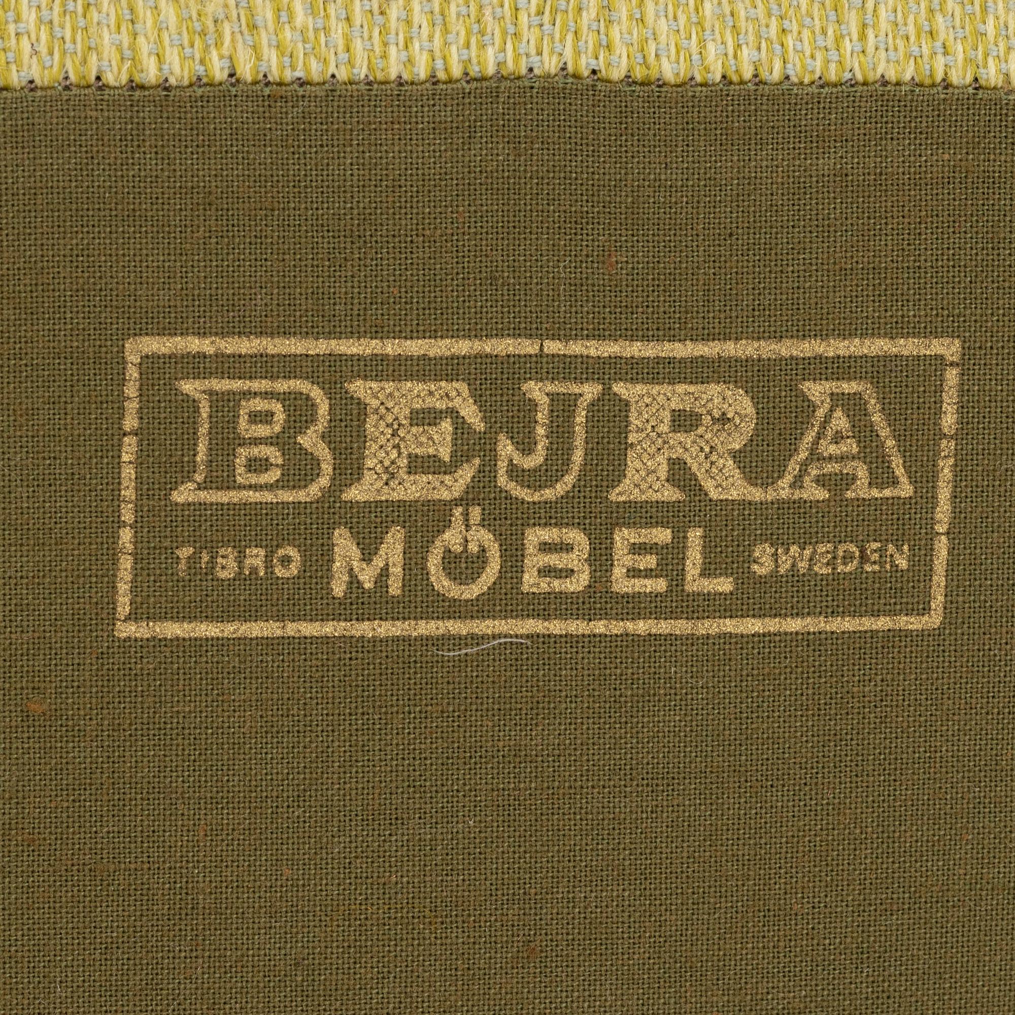 A pair of 1960s easy chairs.